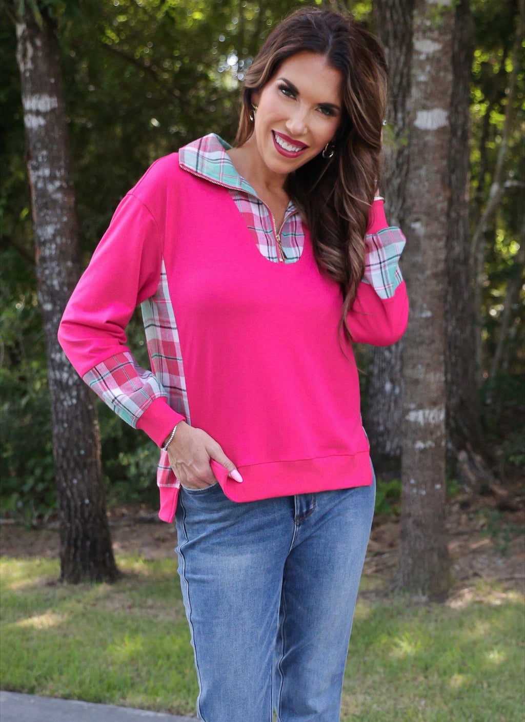 Pink Juniper Plaid Pullover by Jess Lea, featuring a cozy knit fabric and stylish plaid pattern.