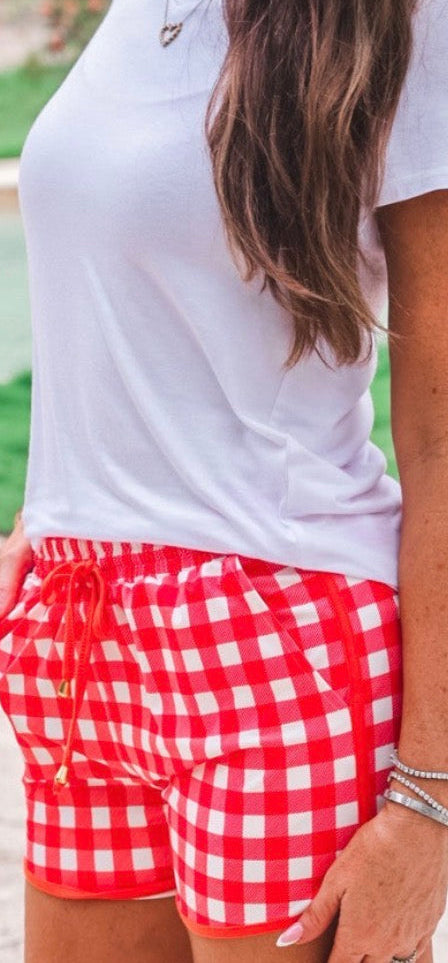 Red Gingham Jess Lea everyday shorts with a relaxed fit and elastic waistband, perfect for casual summer wear.