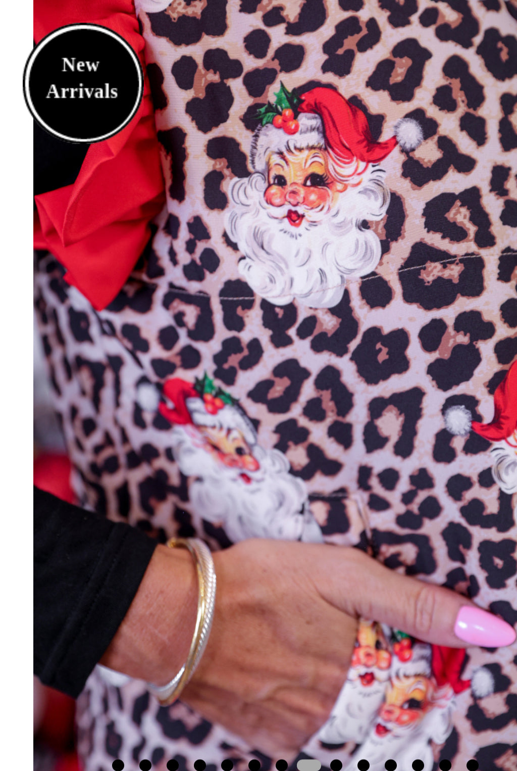 Jess Lea Santa Safari Chic puffer vest with festive pattern and cozy design, perfect for winter layering.