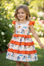 Kids Charm Online dog printed character dress with ruffle trim, featuring playful cartoon dog design for kids.