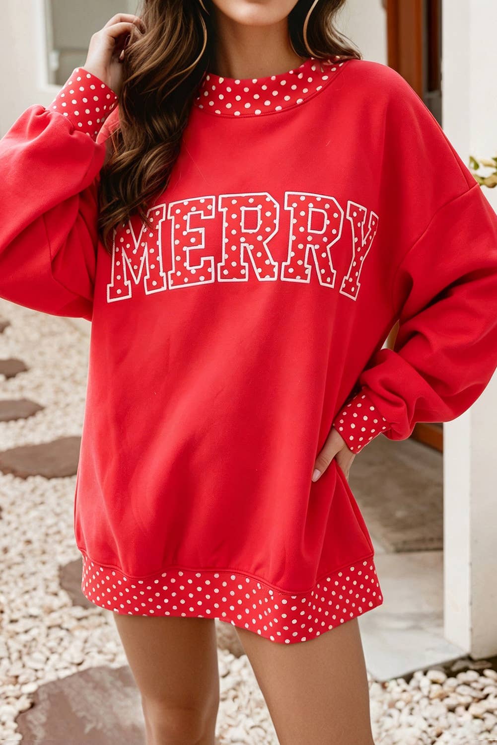 Little Daisy Closet red holiday mock neck sweatshirt with polka dot contrast trim and cozy sweatshirt fabric.