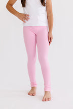 Pink bubblegum leggings for babies by Mila & Rose ®, featuring soft, stretchy fabric for comfortable wear in size 6-12 months.