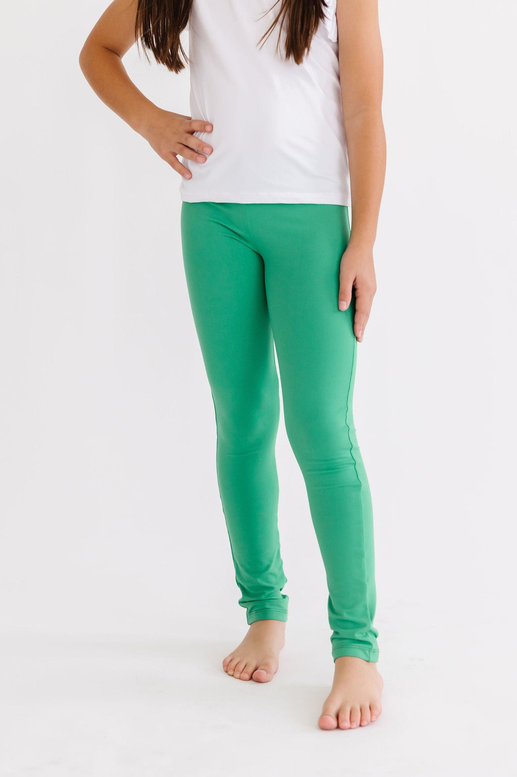 Kelly green Mila & Rose leggings for babies, soft and stretchy, showing the full length and elastic waistband.