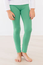 Kelly green Mila & Rose leggings for toddlers, soft and stretchy, featuring a comfortable fit for babies aged 6 to 12 months.