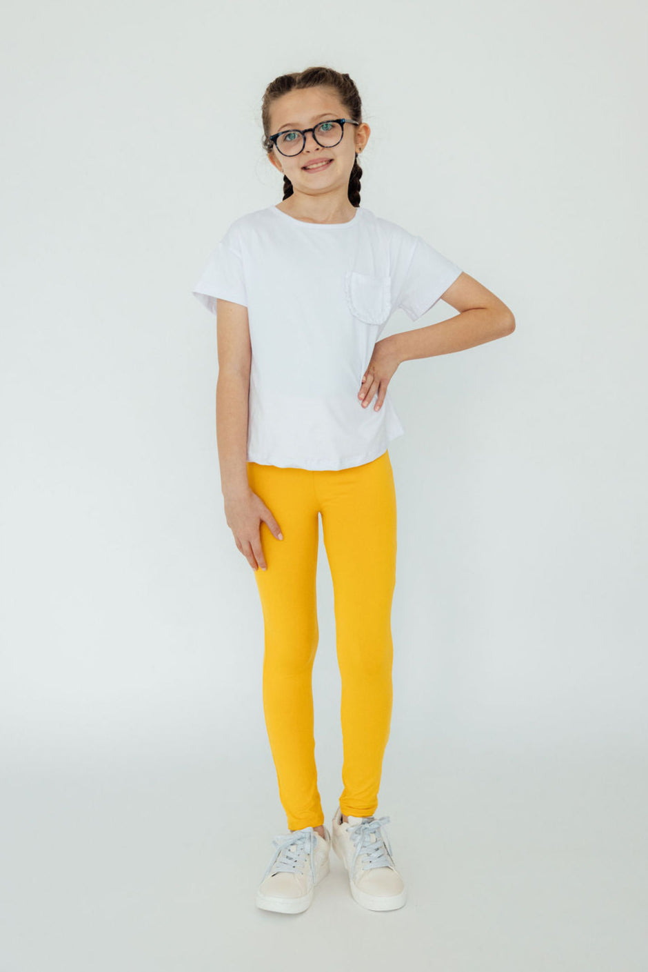 Mustard Mila & Rose® leggings for toddlers, soft stretchy fabric, close-up of elastic waistband and vibrant color.