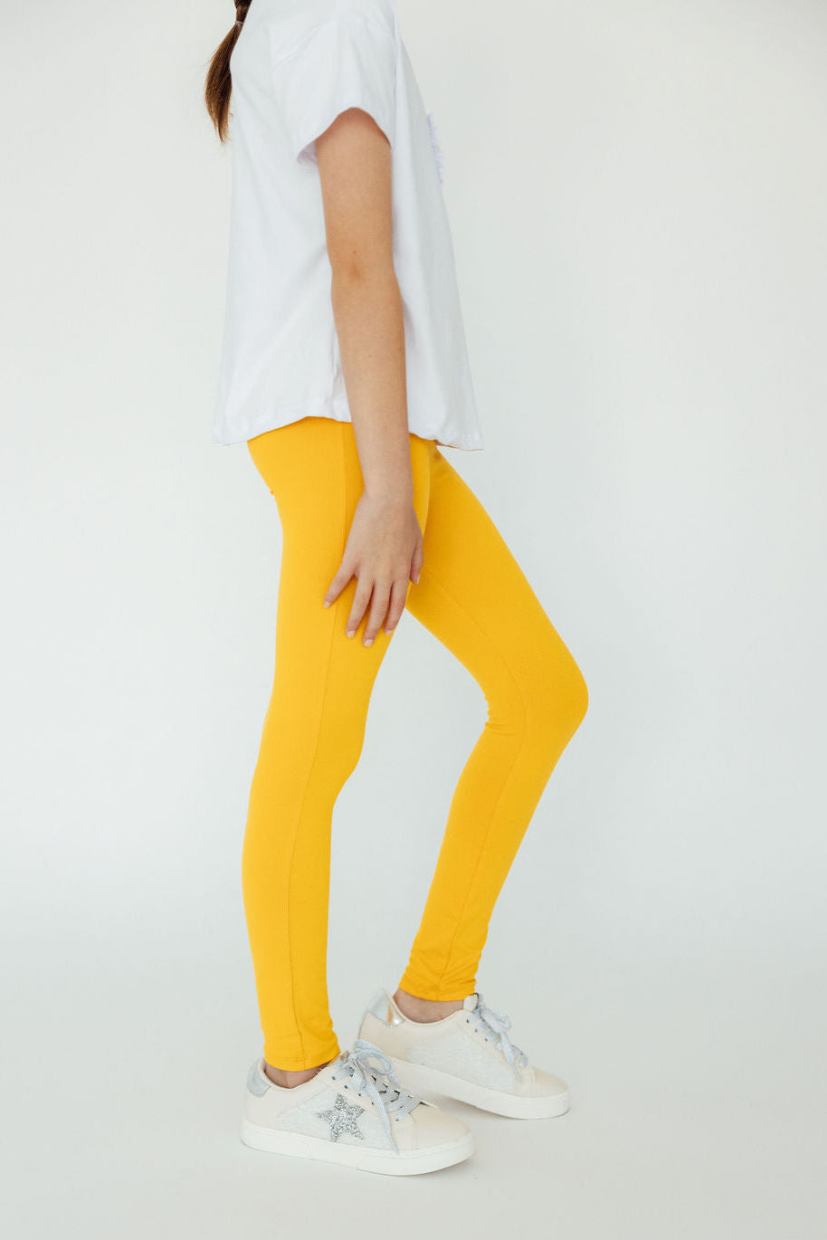 Mustard Mila & Rose® leggings for babies, featuring soft fabric and elastic waistband, suitable for infants aged 6-12 months.
