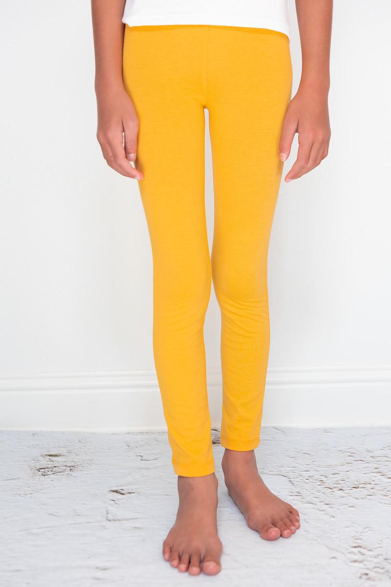 Mila & Rose mustard leggings for babies, soft stretchy fabric, close-up of comfortable baby leggings for ages 6-12 months