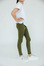 Olive Mila & Rose® leggings for babies, soft fabric with elastic waistband, suitable for 6-12 months.