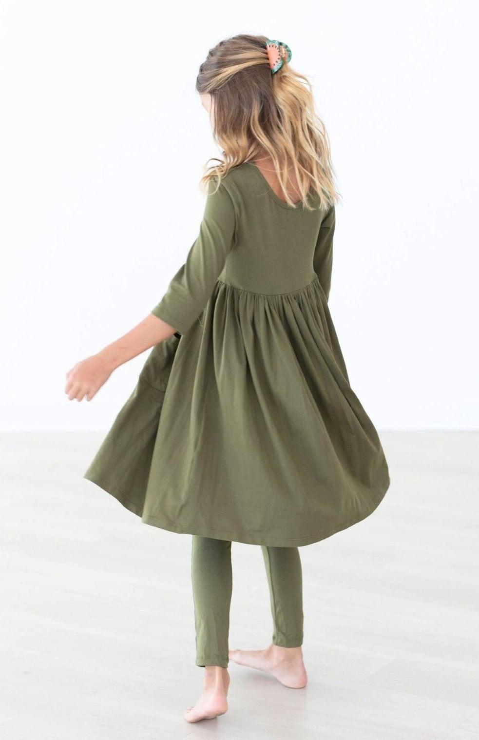 Olive Mila & Rose® leggings for babies aged 6-12 months, soft fabric with a comfortable fit for little ones.