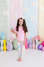 Pastel floral bunnies leggings for babies from Mila & Rose, featuring colorful bunny and floral pattern on soft fabric.