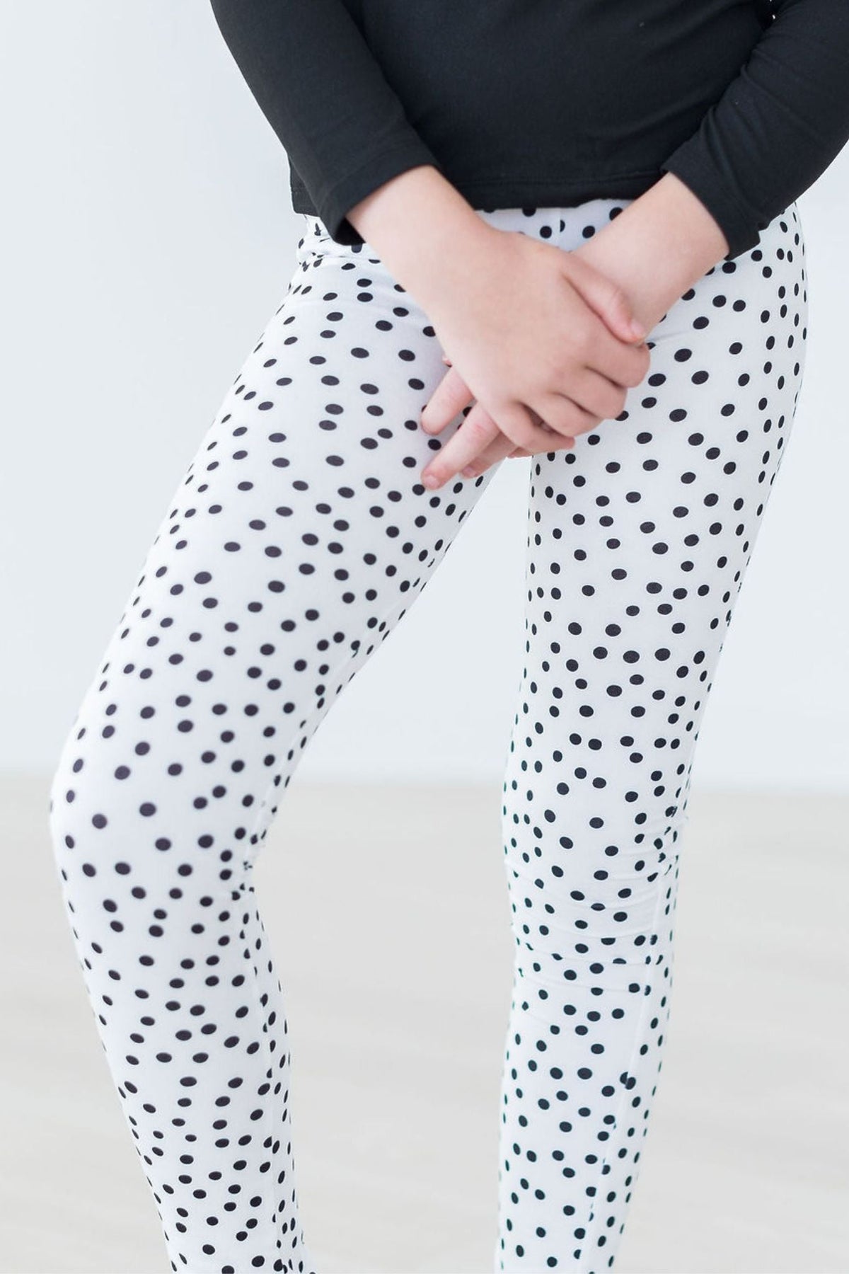 Mila & Rose® scattered dot leggings for babies, featuring colorful dots on soft fabric, perfect for comfortable everyday wear.