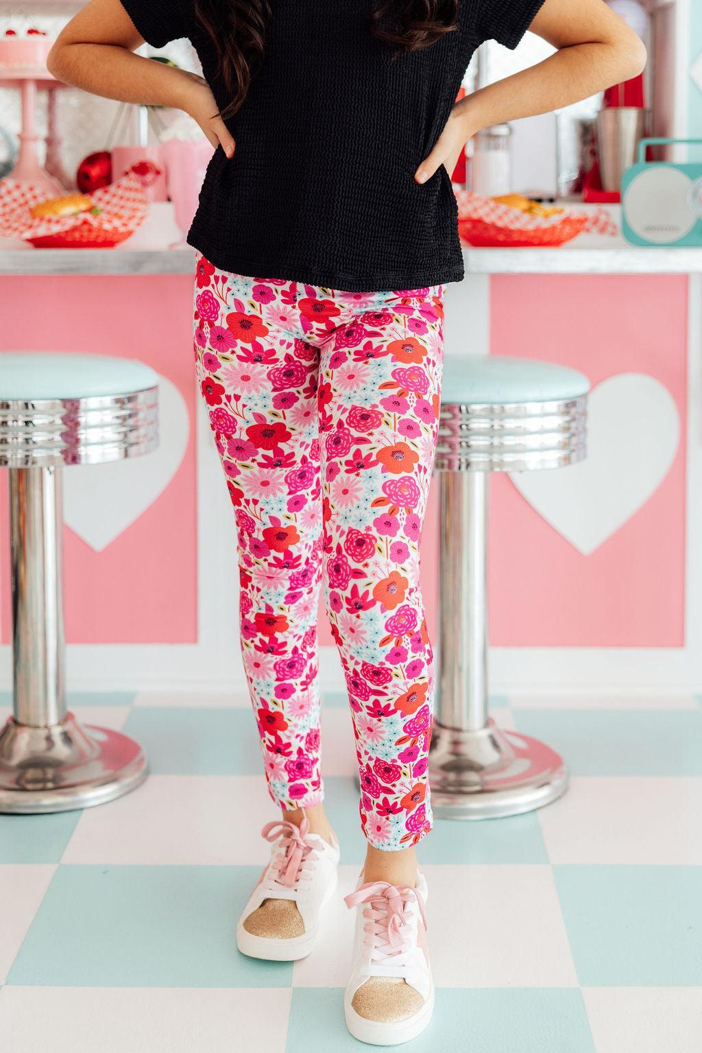 Mila & Rose® Secret Garden baby leggings featuring a colorful floral print for 6-12 months.