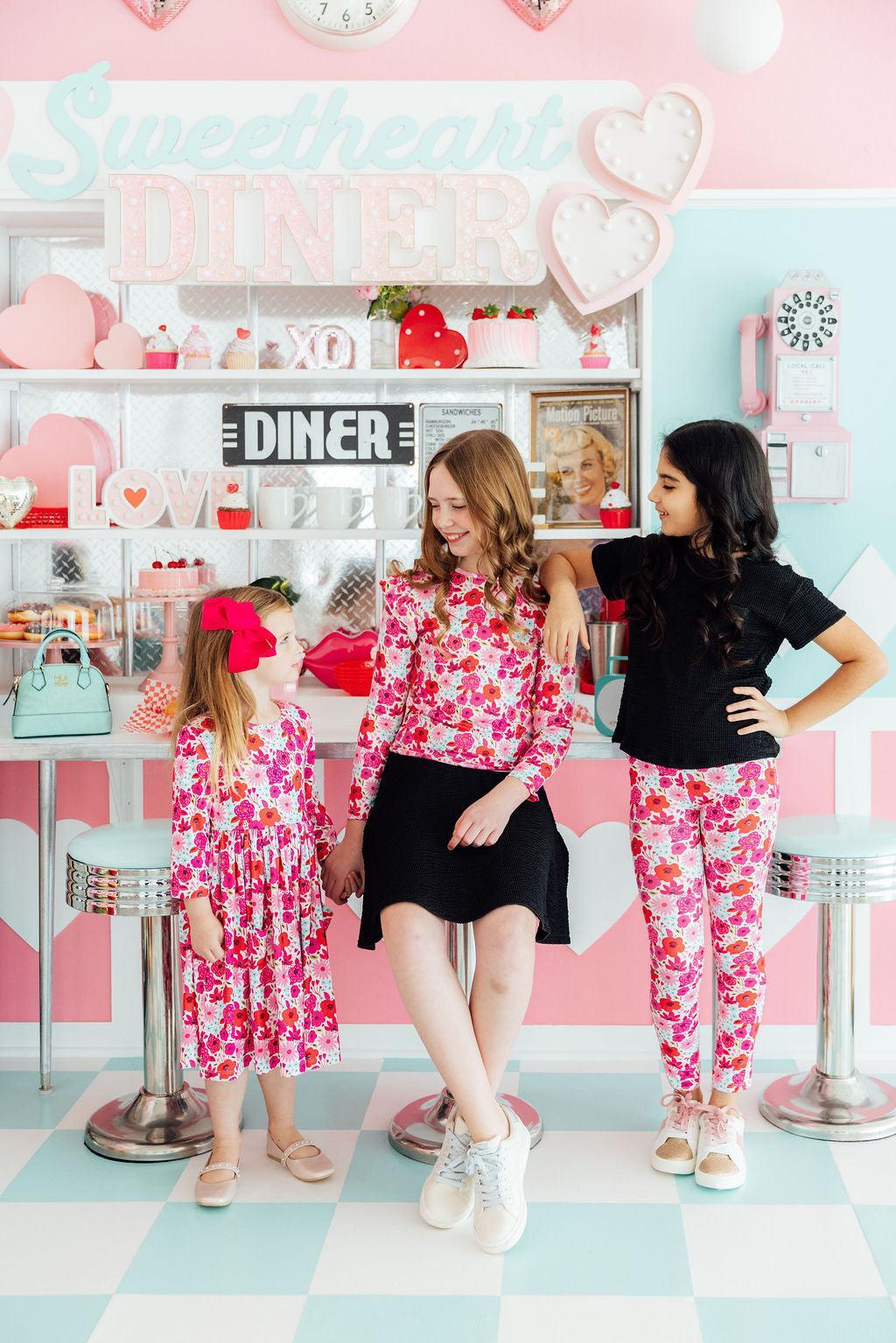 Mila & Rose Secret Garden leggings for toddlers, featuring colorful floral and garden print in soft fabric.