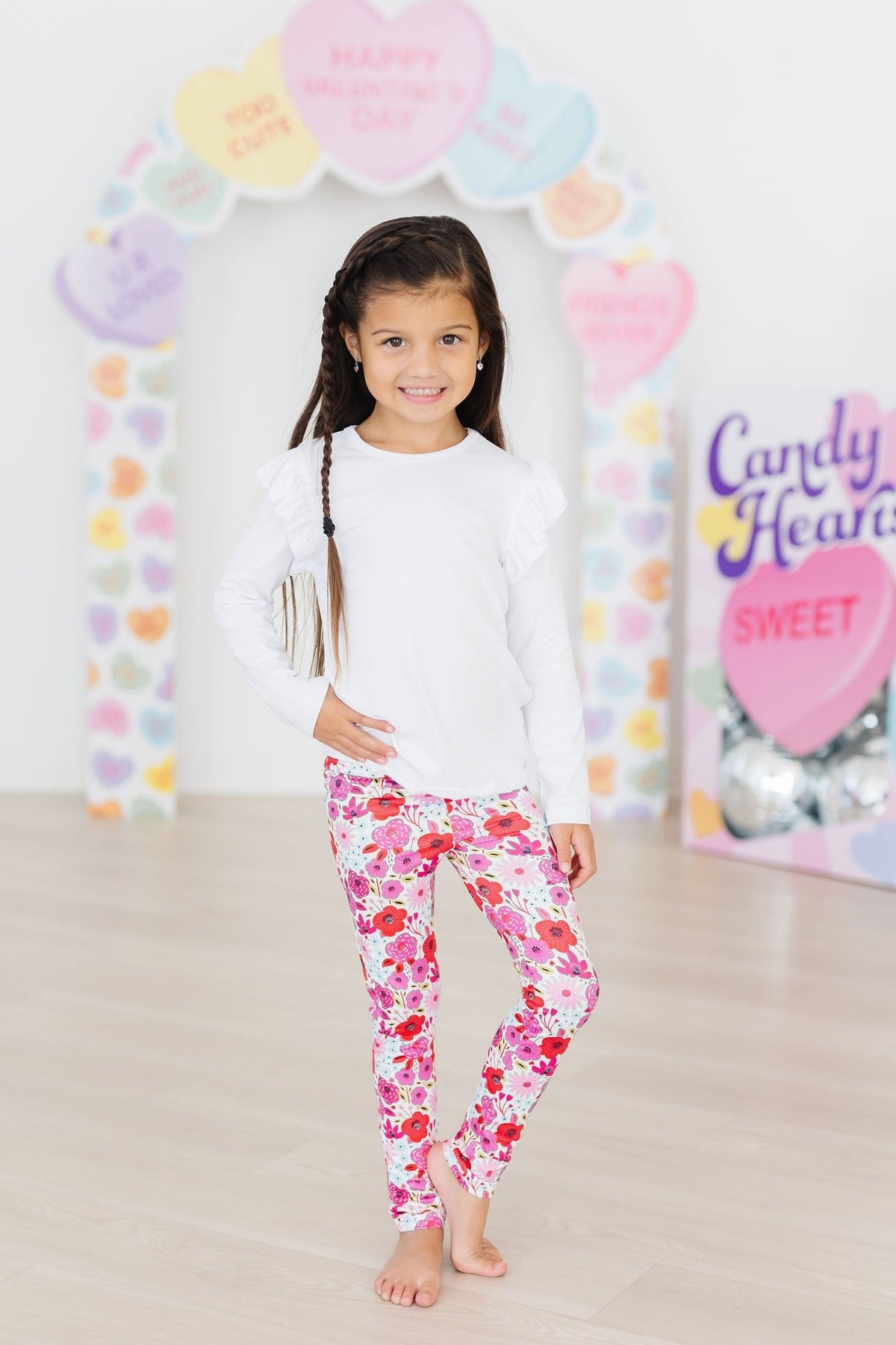 Mila & Rose® Secret Garden leggings for babies aged 6-12 months, featuring a colorful floral garden pattern.