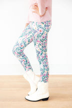 Mila & Rose vivid garden leggings for toddlers, featuring colorful floral patterns and soft stretchy fabric.