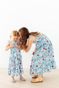 Mila & Rose patriotic petals ruffle maxi dress for toddlers with red, white, and blue floral design and ruffled details.