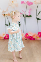 Mila & Rose furry friends pom pom dress for 12-24 months, soft fabric with colorful pom pom details for toddler girls.
