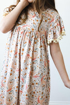 Mila & Rose unicorn-themed Pom Pom Dress for toddlers, featuring colorful pom poms and playful details for special occasions.