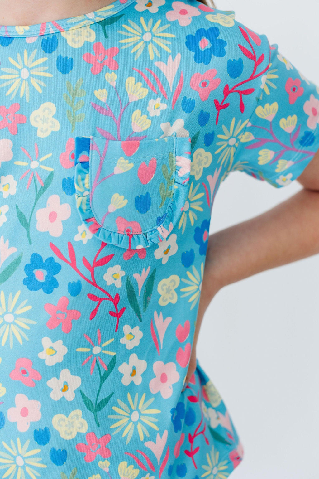 Mila & Rose® springtime splendor ruffle pocket tee for 12-24 months, pink cotton tee with ruffle details and front pocket.