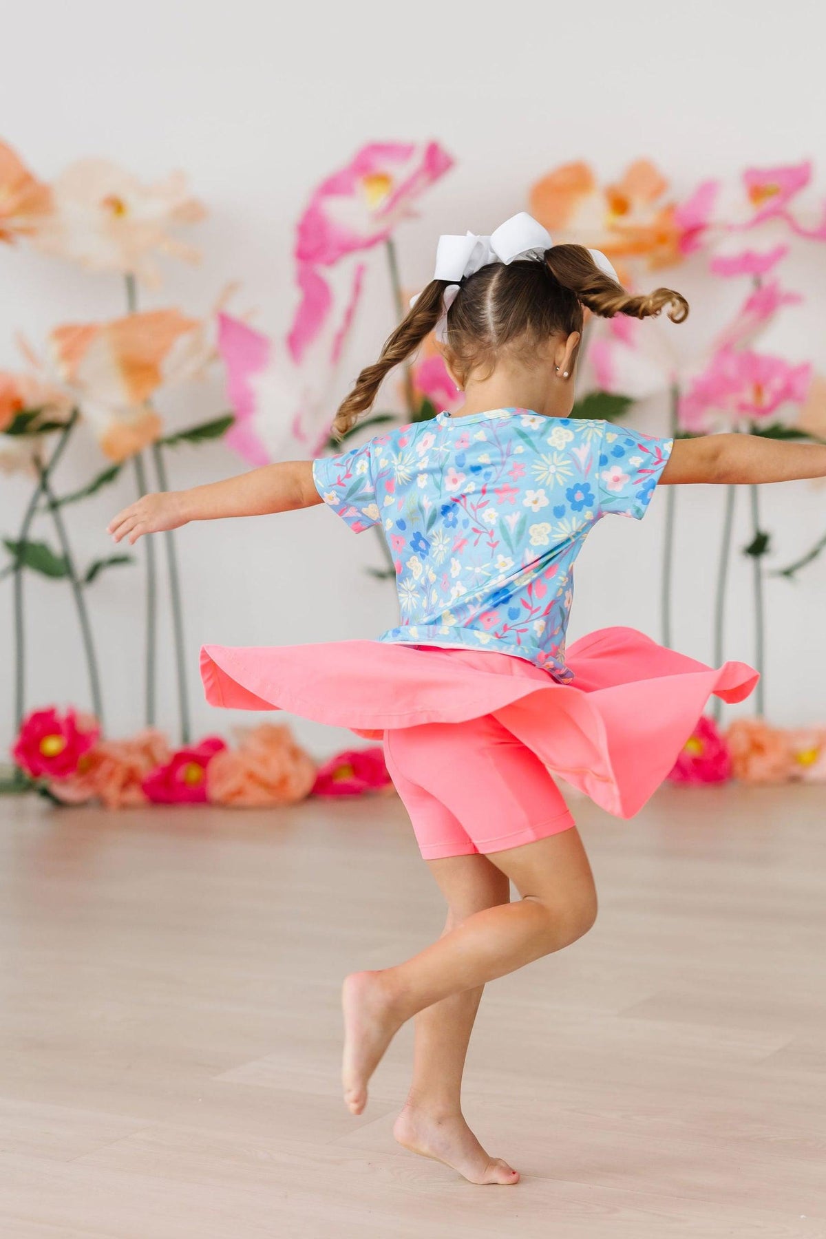 Mila & Rose® Springtime Splendor Ruffle Pocket Tee for toddlers, pink cotton top with ruffle sleeves and pocket detail.