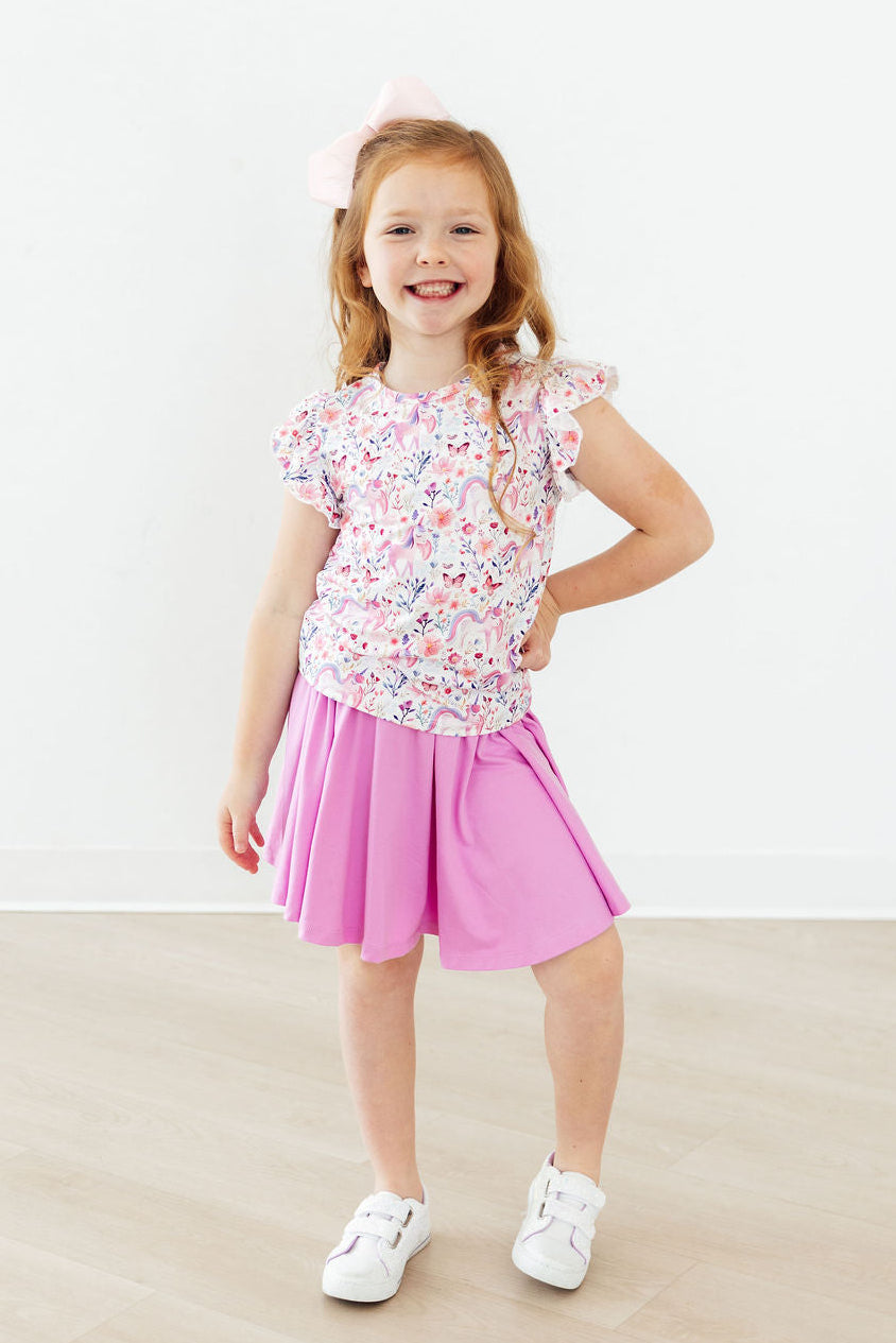 Mila & Rose Whimsical Woods short-sleeve ruffle tee for toddlers, featuring a playful design and soft fabric in a charming style.