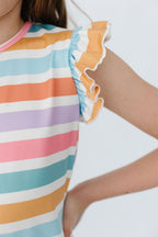 Mila & Rose® Spring Stripes Ruffle Tee for babies, short-sleeve with colorful spring stripe pattern and ruffle details.