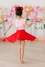Mila & Rose Sweet Strawberries short-sleeve ruffle tee for babies, featuring a cute strawberry print and ruffled sleeves.