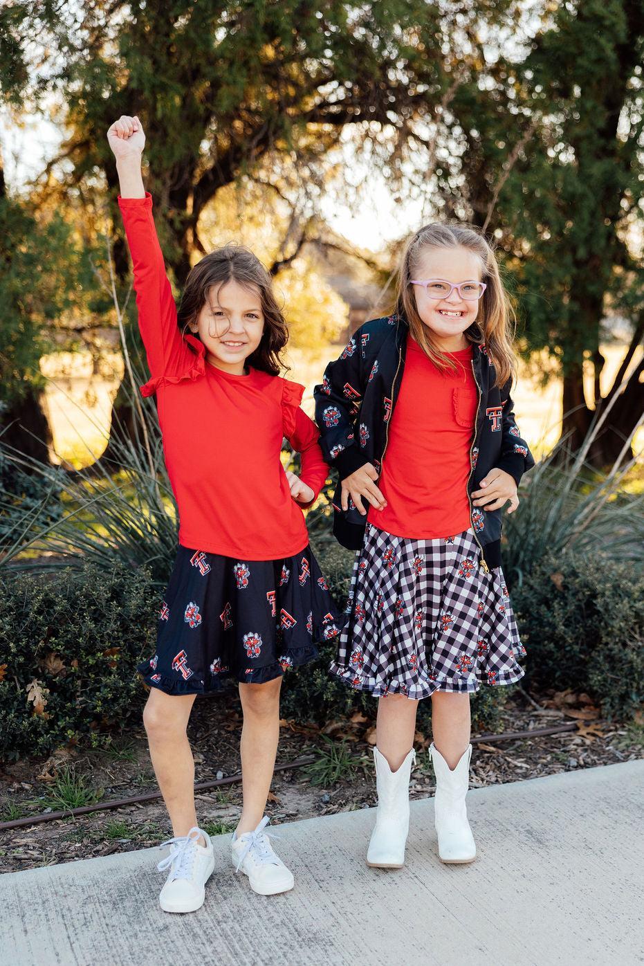 Mila & Rose black Raider Red twirl skort with ruffle details for toddlers, featuring Texas Tech team colors and playful design.