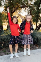 Mila & Rose black Raider Red twirl skort with ruffle details for toddlers, featuring Texas Tech team colors and playful design.