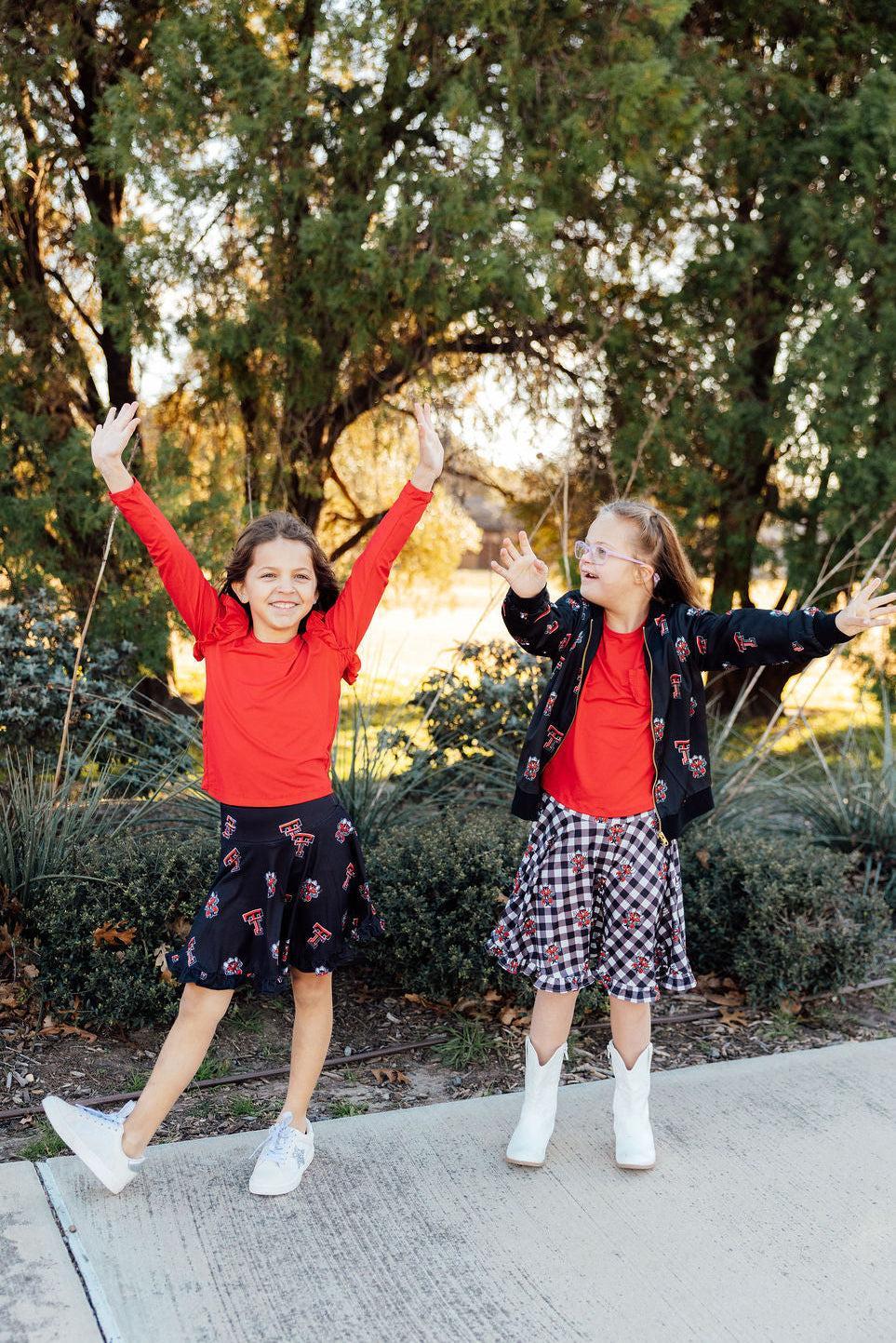 Texas Tech Black Raider Red ruffle twirl skort by Mila & Rose ®, featuring a playful, flared design with ruffle details.