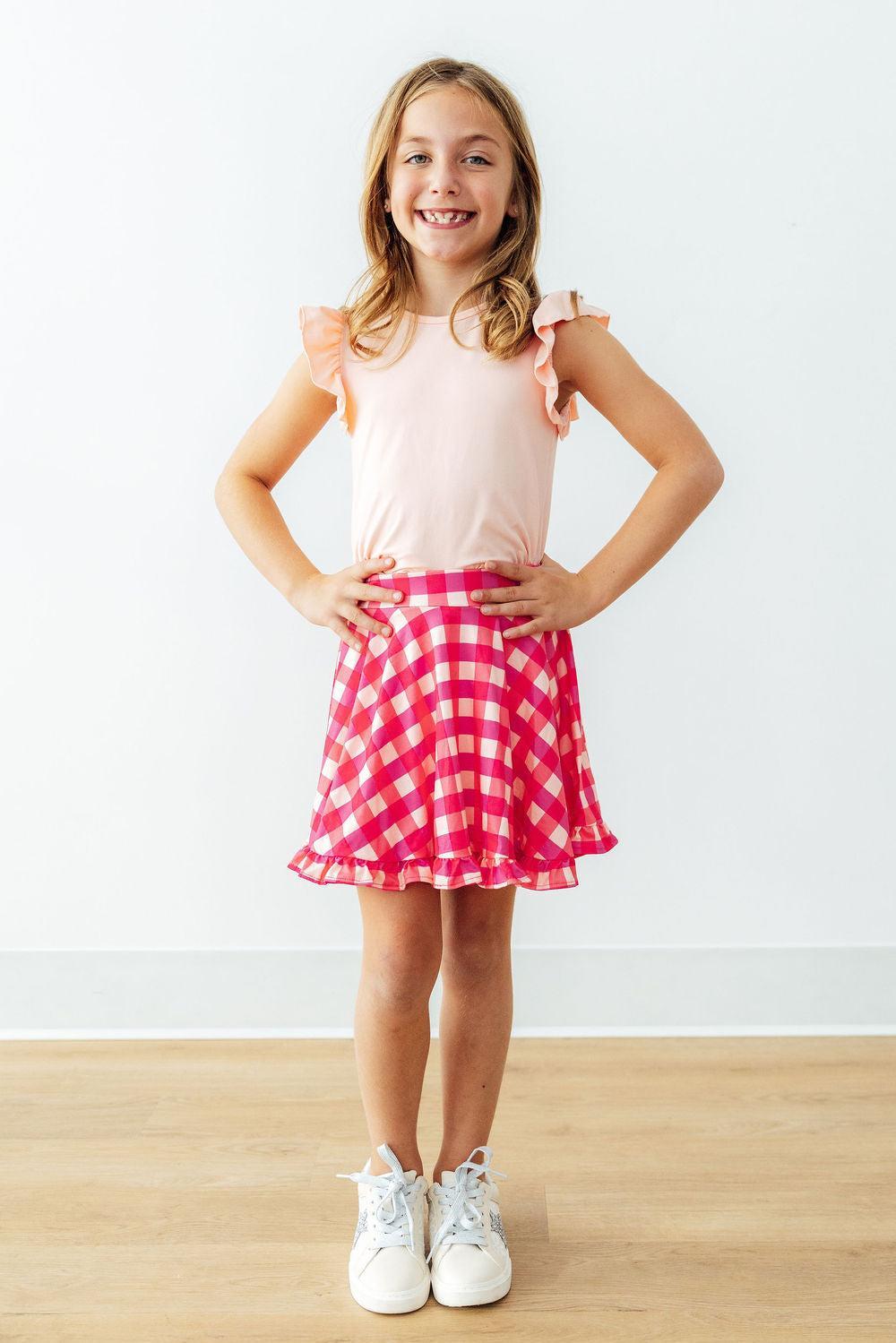 Hot pink gingham ruffle twirl skort for baby girls, by Mila & Rose, featuring playful ruffles and a fun, twirling design.