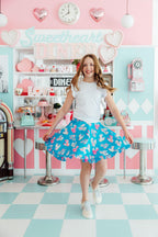 Mila & Rose® ruffle twirl skort for babies, pink with ruffled hem, designed for 6-12 months, perfect for playful outfits.