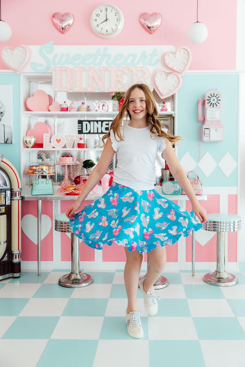 Mila & Rose® ruffle twirl skort for babies, pink with ruffled hem, designed for 6-12 months, perfect for playful outfits.
