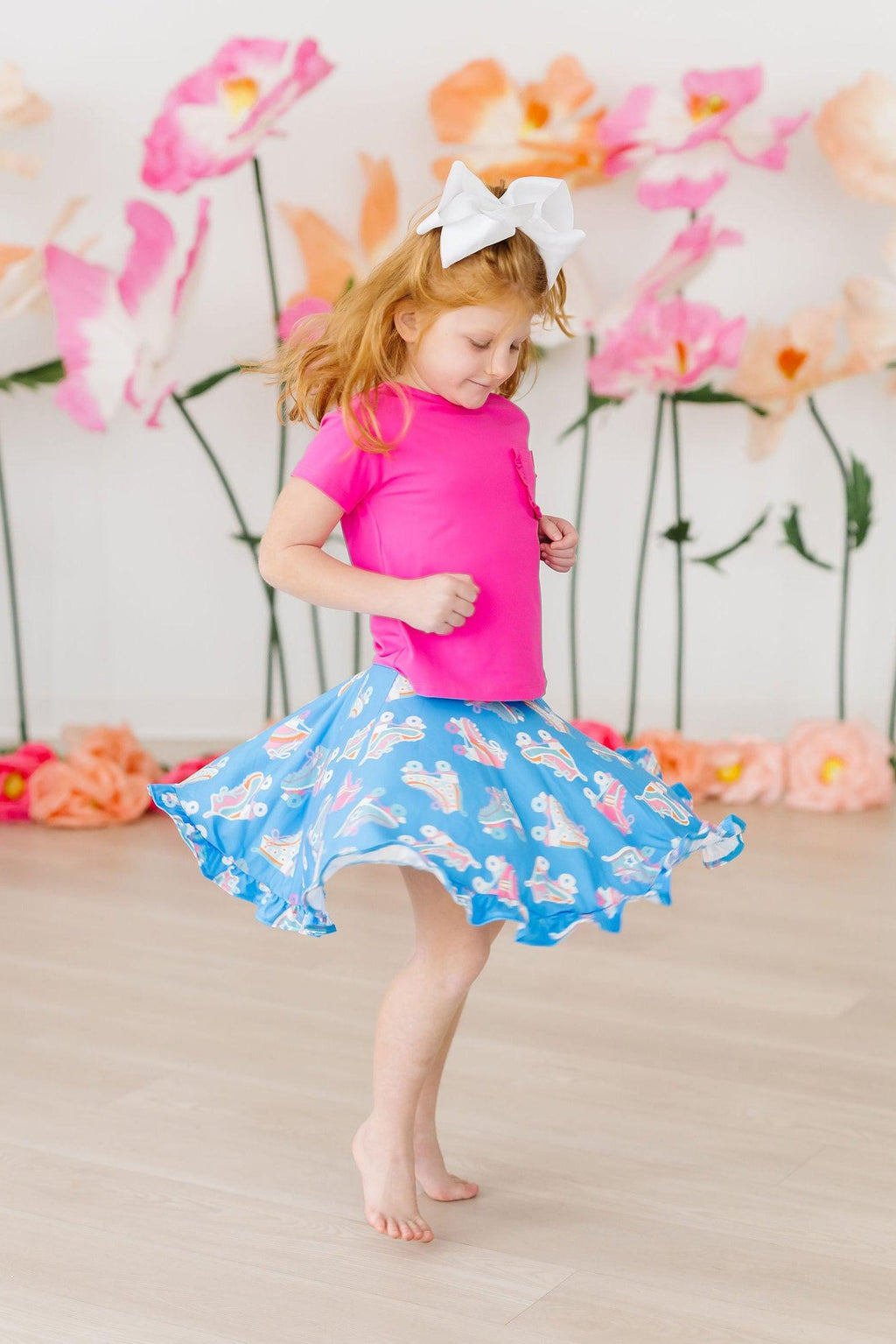Mila & Rose® ruffle twirl skort for girls, pink with ruffled hem, perfect for playful outdoor activities and casual wear.