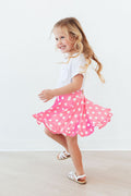 Pink polka dot ruffle twirl skort for babies by Mila & Rose, featuring a cute ruffled design and playful pattern.