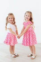 Pink polka dot ruffle twirl skort for babies from Mila & Rose, featuring a cute, layered ruffle design for little girls.