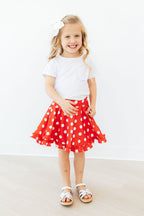 Red polka dots Mila & Rose ruffle twirl skort for 6-12 months, featuring a playful ruffle design and comfortable fit.