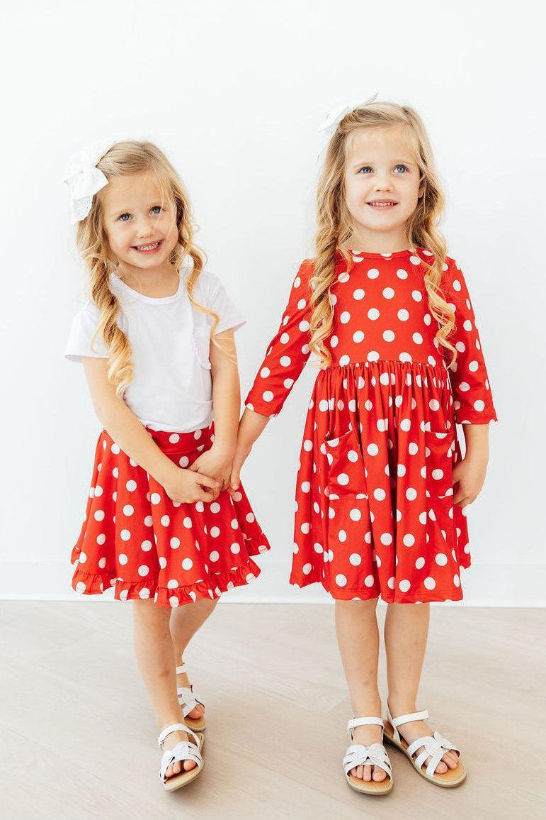 Red polka dot ruffle twirl skort for babies by Mila & Rose, featuring a playful ruffled design and comfortable fit.