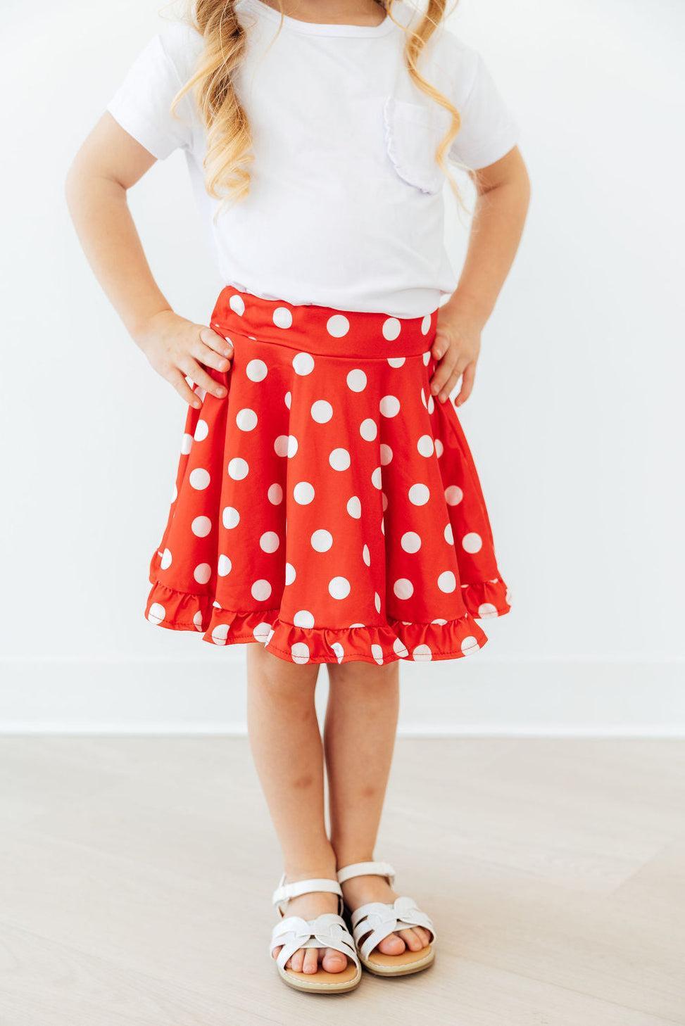Red polka dot ruffle twirl skort for babies, by Mila & Rose, featuring a playful ruffled design and comfortable fit.