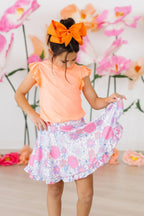 Mila & Rose sweet springtime ruffle twirl skort for babies, pink with ruffle details and elastic waistband, perfect for spring.