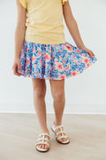 Watercolor floral ruffle twirl skort for 6-12 months by Mila & Rose, featuring a playful ruffle and colorful floral print.