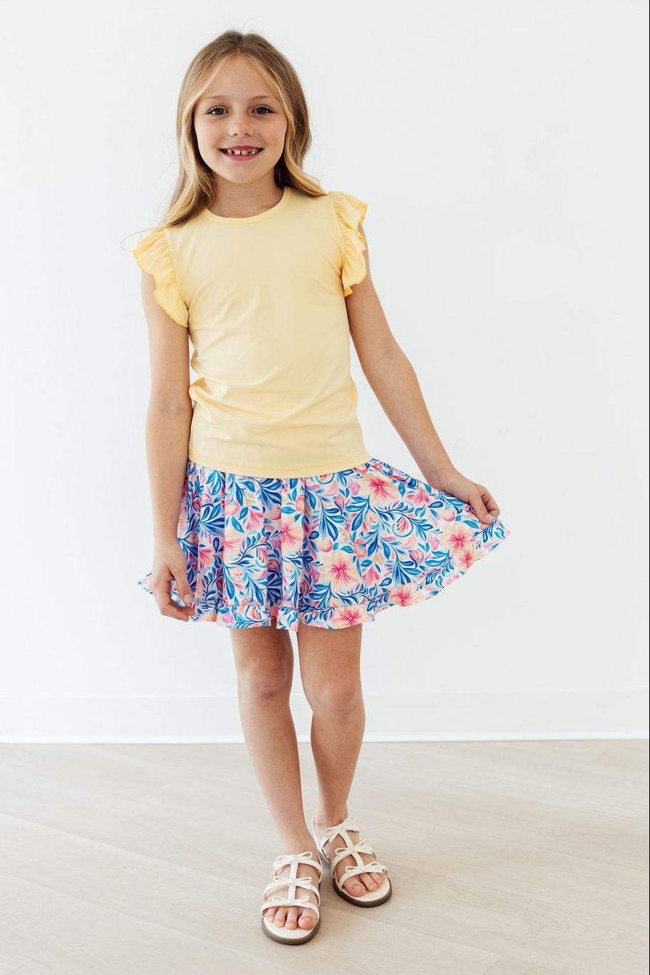 Watercolor floral ruffle twirl skort for girls in size 6-12 months by Mila & Rose, featuring a playful ruffle detail and vibrant floral print.