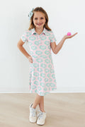 Toddler girl's green short-sleeve polo dress by Mila & Rose, featuring a classic collar and comfortable fit.
