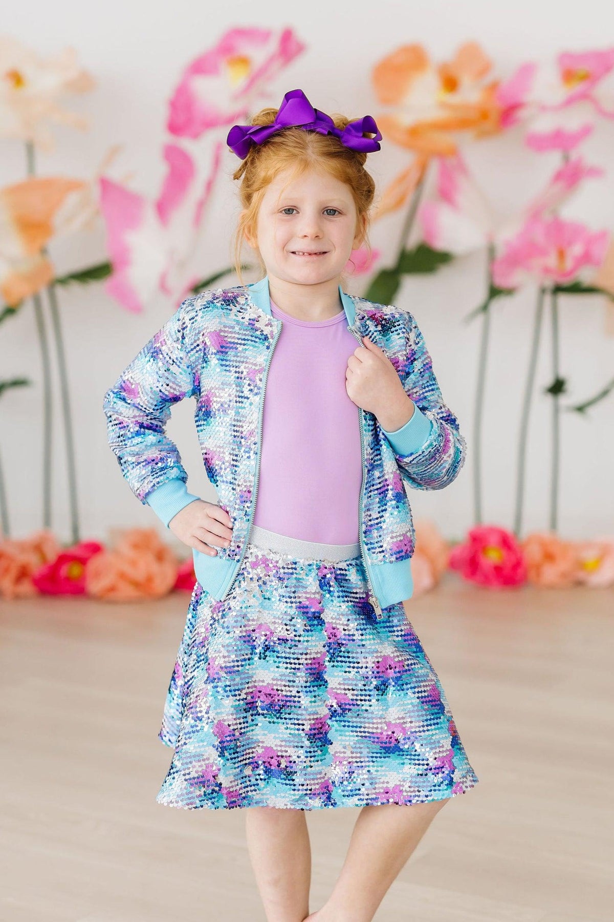 Mila & Rose mermaid flip sequin twirl skort in vibrant blue with shiny sequin details and playful mermaid design.