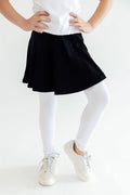 Black and white twirl Mila & Rose® skegging shown on a model, featuring a fitted, stretchy athletic leggings design.