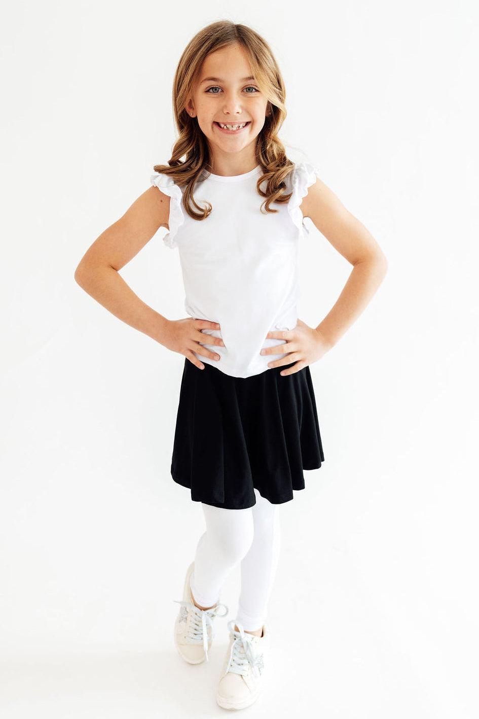 Black and white Twirl Skegging by Mila & Rose ®, form-fitting athletic leggings with a stylish swirl pattern.