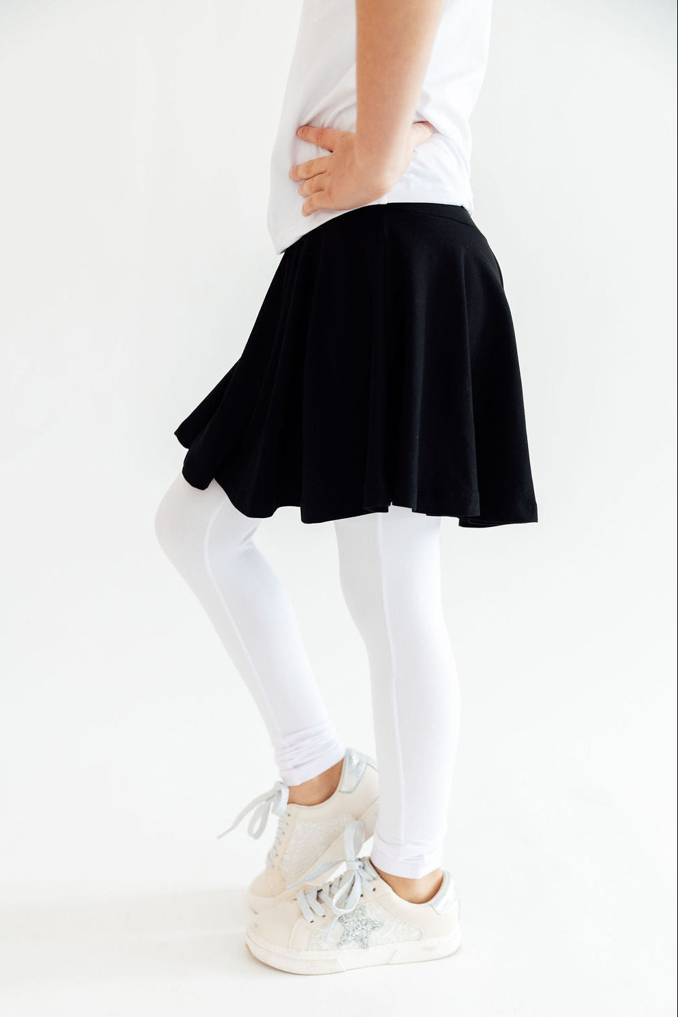 Black and white Mila & Rose® Twirl Skegging displayed on a model, showcasing the stylish, fitted design and twirl pattern.
