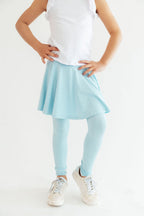 Blue Mila & Rose ® Twirl Skegging featuring a vibrant bluebird pattern, fitted stretchy leggings for women.