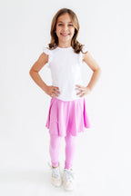 Bright lilac Mila & Rose skegging with a twirl pattern, form-fitting and stretchy for comfortable active wear.