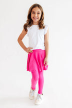 Hot pink Mila & Rose® twirl skegging, stretchy and fitted athletic leggings with vibrant pink and swirling pattern.